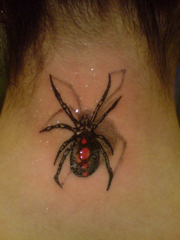 Climbing spider tattoo on neck