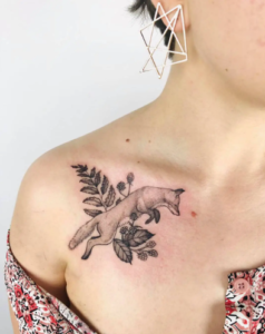 Black And Gray Fox Tattoo on Woman’s Collarbone
