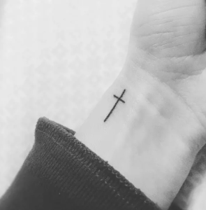 Delicate Cross tatto