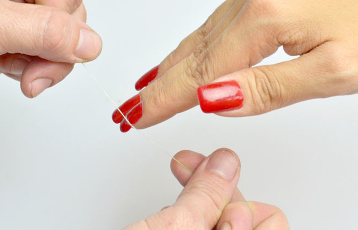 take away Acrylic Nails the usage of Dental Floss
