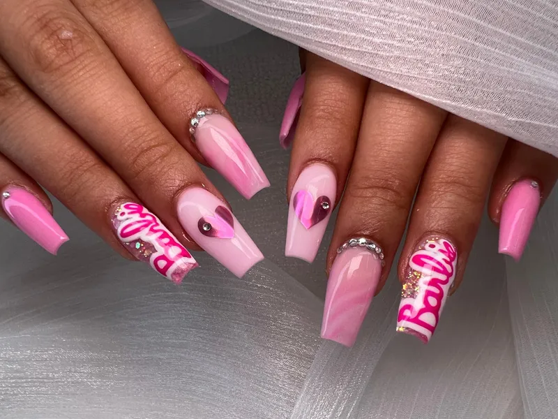 Luminous Pink Nails Enhanced with Crystal Accents