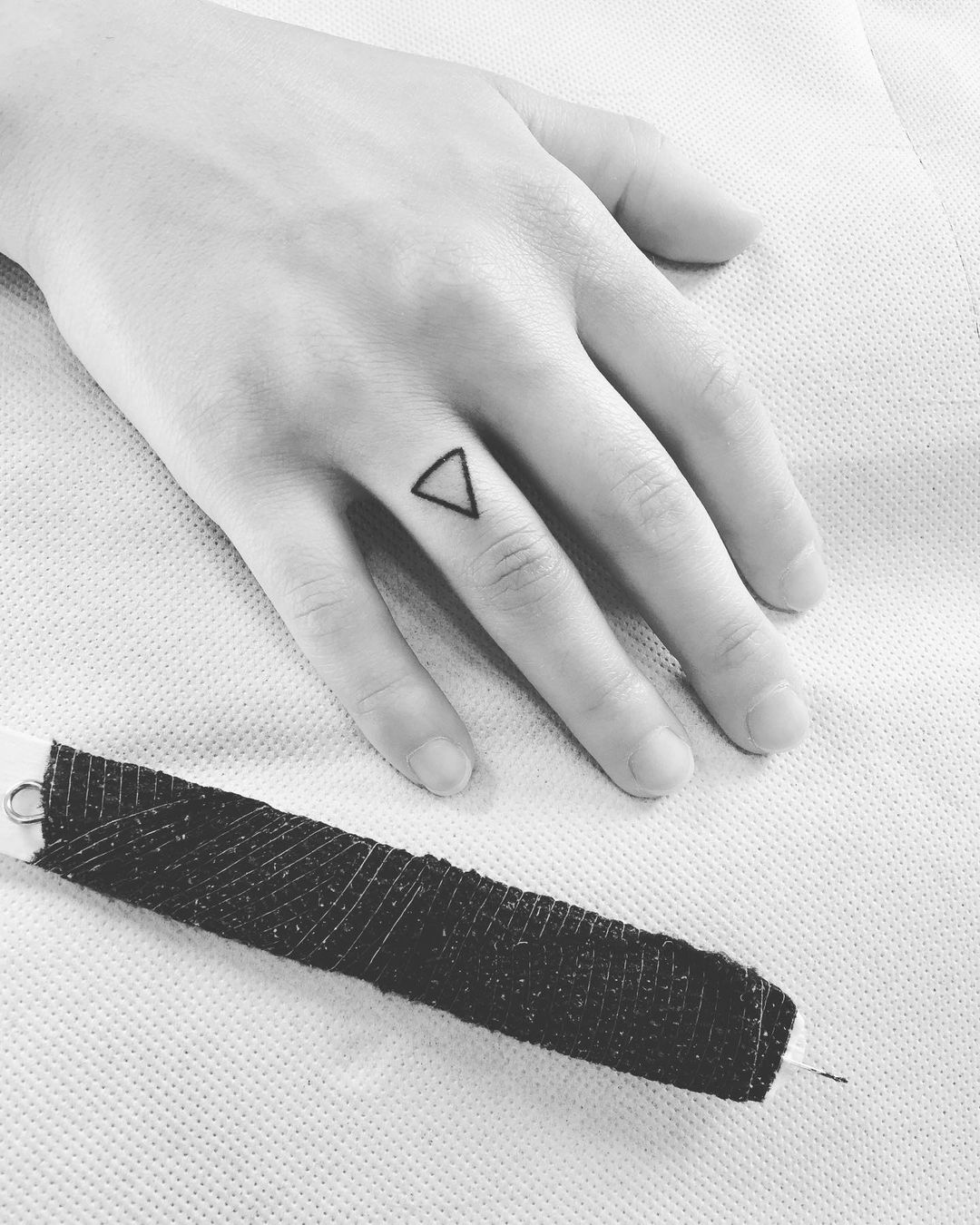 Simple triangle tattoo line