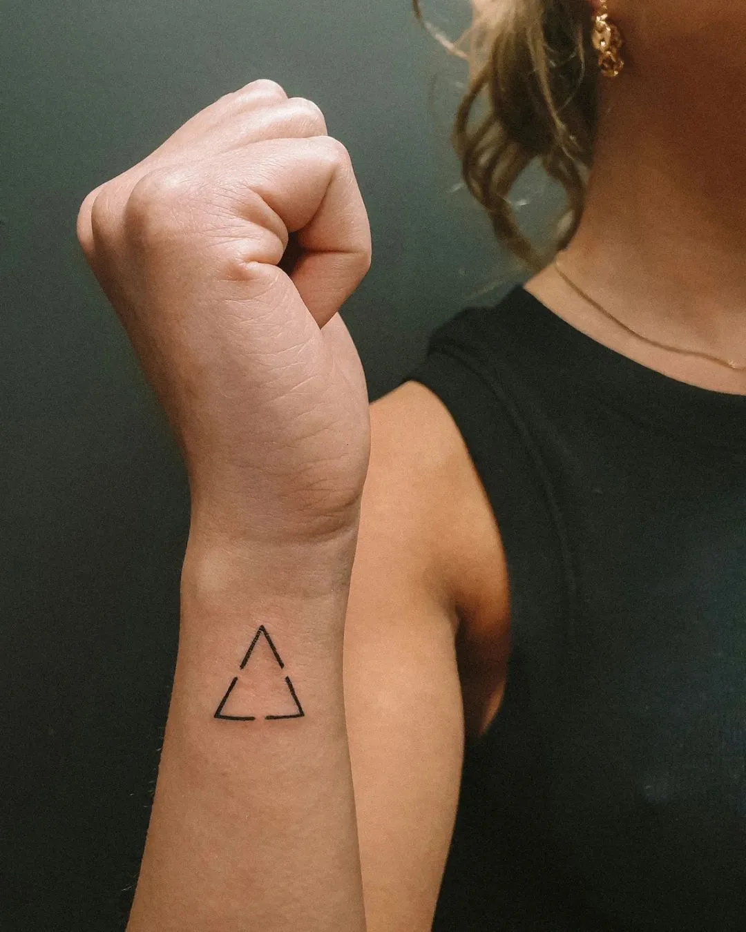 Tattoo of triangles and lines